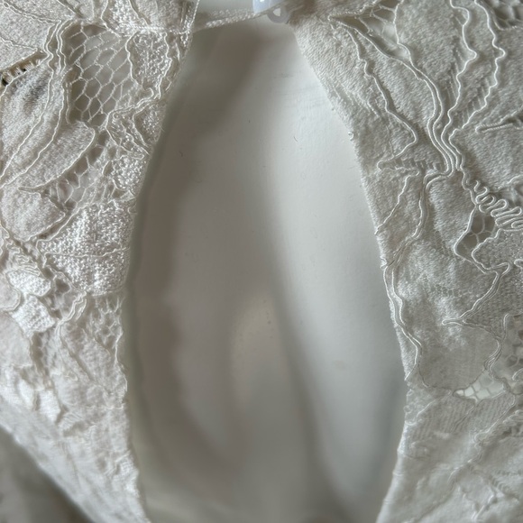 White Mini Dress with Long Bishop Sleeves and V-Neck - Picture 4 of 10